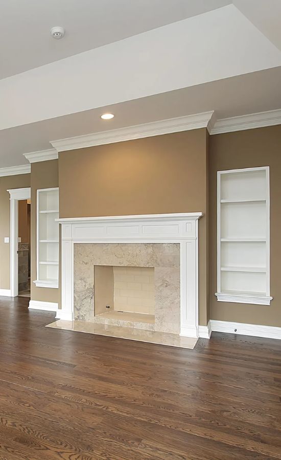 Living room with freshly painted walls and trim by professional painters.