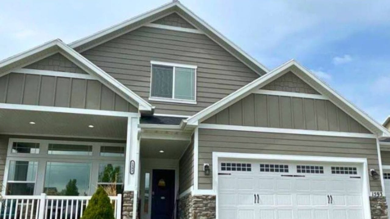 A newly painted exterior of a house in Fort Worth, TX using a beige paint.