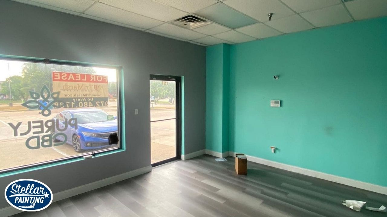 Painting Company Alexandra Meadows Fort Worth, TX - Versatility Across Project Types - Stellar Painting This is a commercial interior painting project in Alexandra Meadows Fort Worth, TX, by Stellar Painting, showing bold teal and gray accent walls inside a retail space.